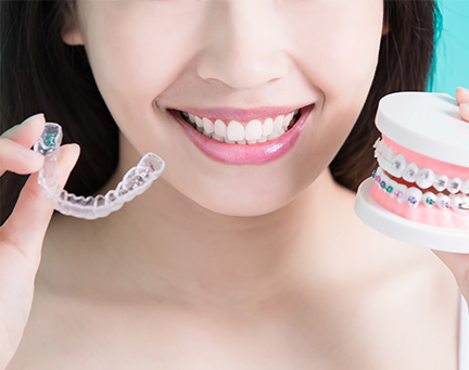 woman with clear aligner